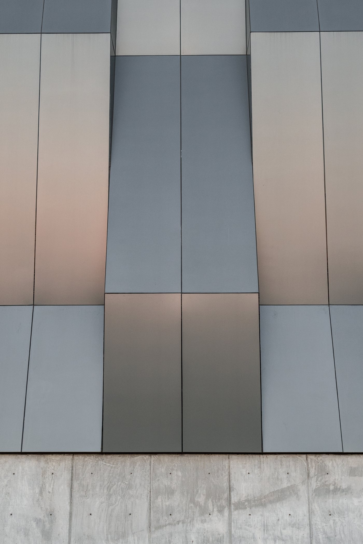 Overlapping metal panels on a building facade